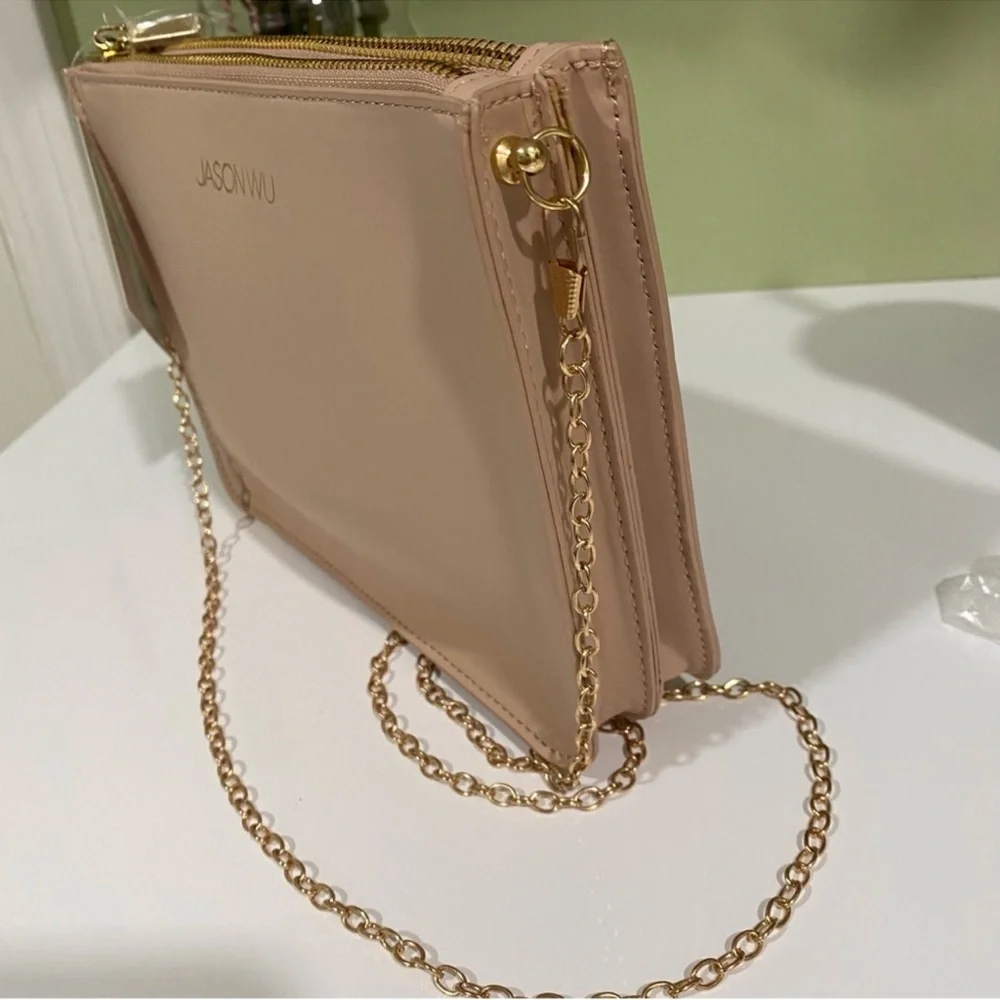 Authentic Jason Wu cosmetic beauty pouch converted to a crossbody bag